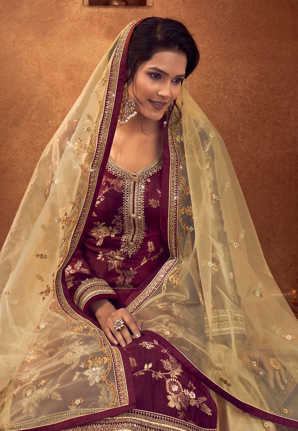 Maroon And Golden Embroidered Lehenga style suit